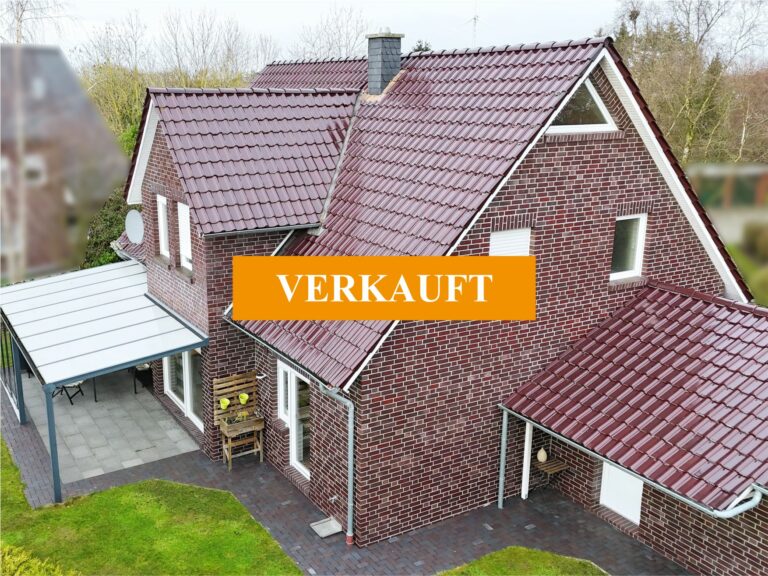 Charmantes Einfamilienhaus mit großer Garage in zentraler Lage!